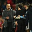 'Keep calm': Pep Guardiola reacts with his players and staff after Wednesday's 2-0 win