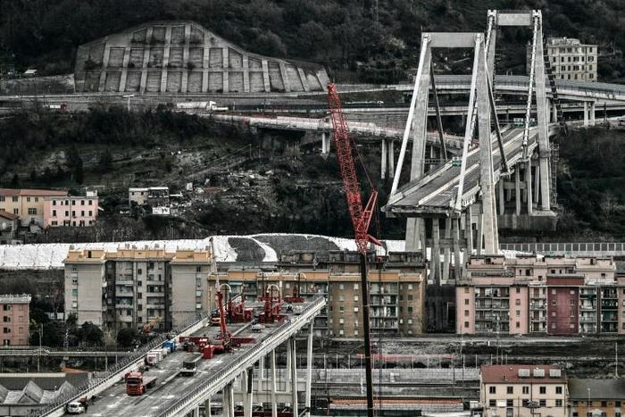 Thousands of tonnes of steel, concrete and asphalt have already been removed from the spectacularly truncated high-rise bridge to make it lighter before the 'deconstruction' begins