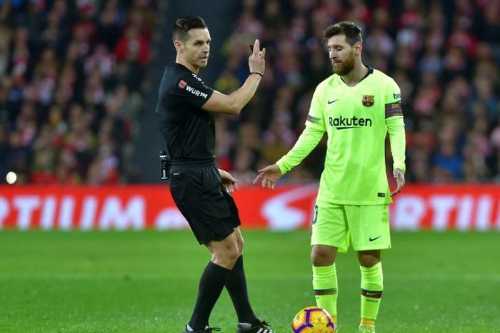 Day of frustration: Lionel Messi speaks with referee Carlos del Cerro Grande