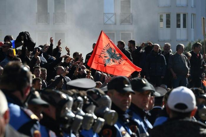 Two police officers were hospitalised and four demonstrators had to be treated for breathing problems