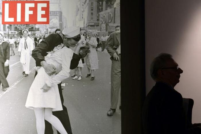 In the famous image, one of four taken by Alfred Eisenstaedt for Life magazine, George Mendonsa is seen ecstatically bending over and kissing a woman in a white nurse's uniform