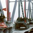Red Army tanks cross the Friendship Bridge on the river border between Afghanistan and Soviet Uzbekistan on February 15, 1989, the last day of the Soviet retreat after 10 years of occupation