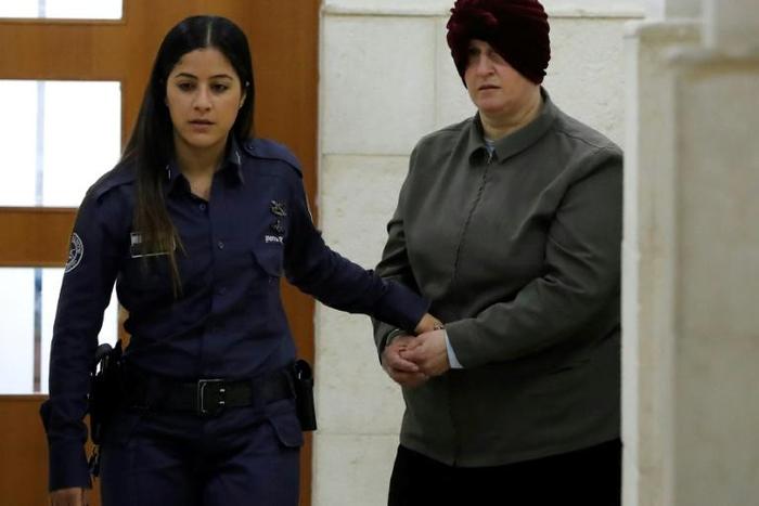 After allegations surfaced against her in 2008, Malka Leifer (R) and her family left Australia for Israel