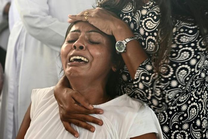 At least 310 people were killed after suicide bomb blasts ripped through three hotels and three churches as worshippers attended Easter services