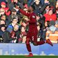 Pointing the way: Georginio Wijnaldum celebrated after Liverpool's second goal in the Premier League leaders' 3-0 win over Bournemouth at Anfield