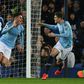 Manchester City's Aymeric Laporte celebrates scoring the opening goal at Everton