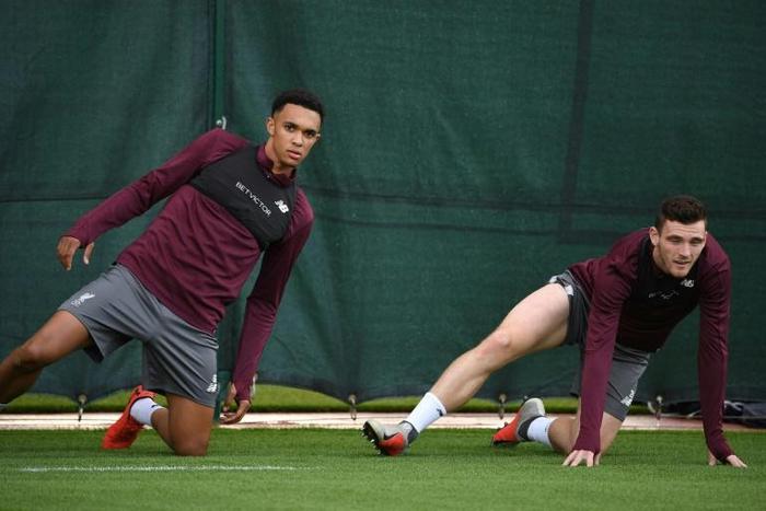 Liverpool defenders Trent Alexander-Arnold (left) and Andrew Robertson have 24 assists between them this season