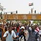 Sudanese chant slogans as they gather during a demonstration outside the army headquarters in Khartoum on May 2, 2019