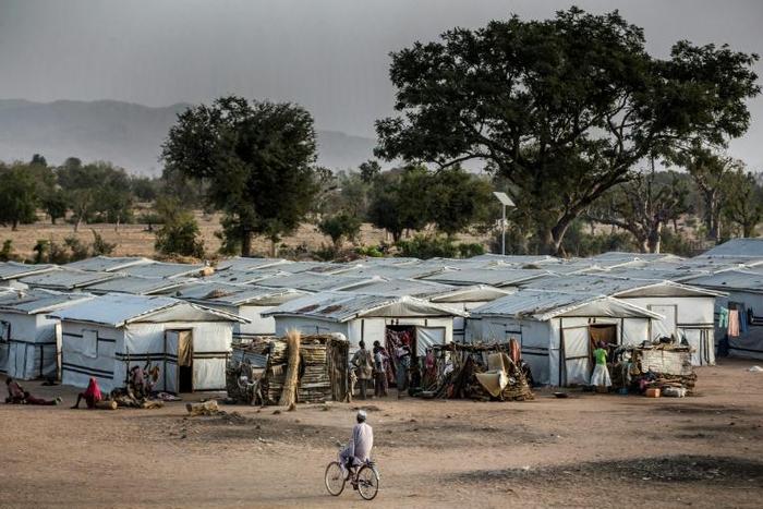 The Malkohi camp today is made up of rows of shacks separated by dirt paths, on which barefoot children and turkeys strut