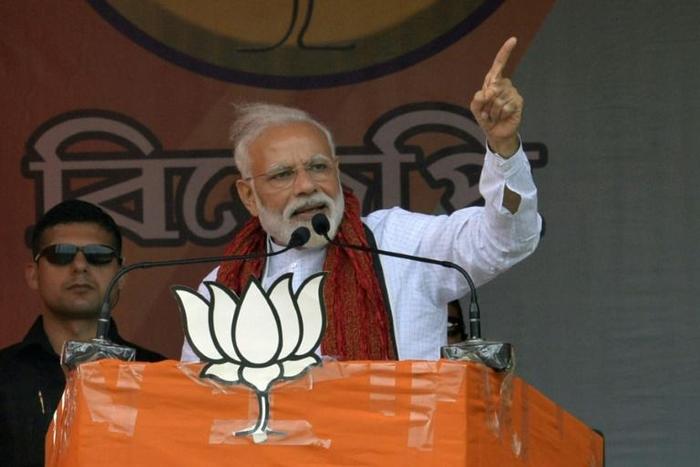 Indian Prime Minister Narendra Modi addresses supporters during a campaign rally in West Bengal
