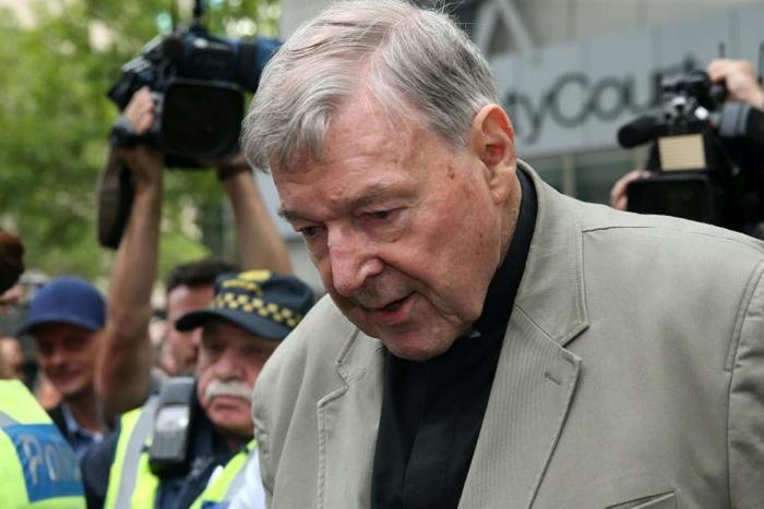 Cardinal George Pell leaves the County Court of Victoria after a jury unanimously found him guilty on one count of sexual abuse and four counts of indecent assault against two boys in the 1990s
