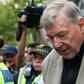 Cardinal George Pell leaves the County Court of Victoria after a jury unanimously found him guilty on one count of sexual abuse and four counts of indecent assault against two boys in the 1990s