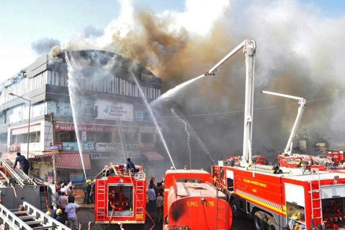 Some students who tried to jump from the burning building were among at least 19 who died