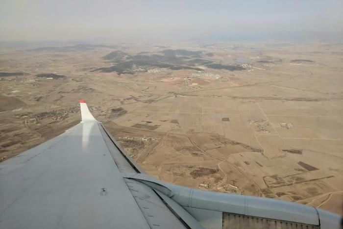 As seen from an airplane, much of North Korea's countryside is dry and parched as the country suffers from what state media says is the worst drought in a century