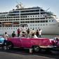 Cubans watch as the first US-to-Cuba cruise ship to arrive in the island nation in decades glides into the port of Havana, on May 2, 2016