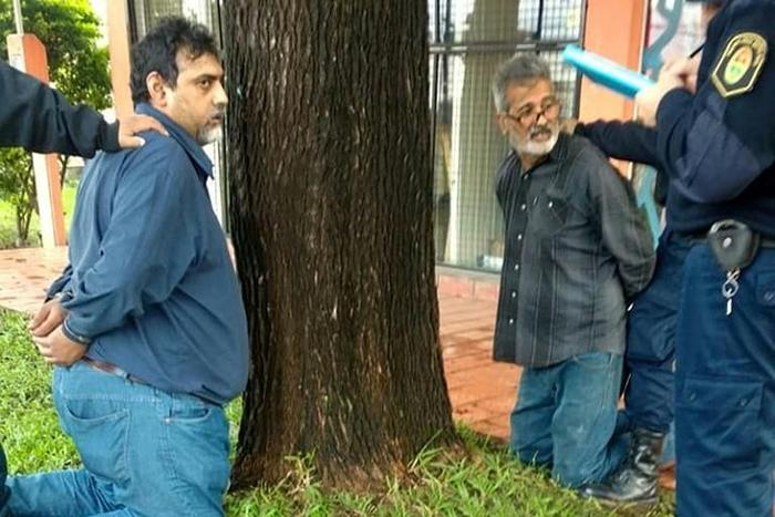 Argentine Juan Jesus Fernandez (left) was arrested, suspected of shooting dead civil servant Marcelo Yadon and leaving lawmaker Hector Olivares in a critical condition