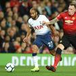 Manchester United defender Phil Jones (right) has extended his contract with the club until 2023
