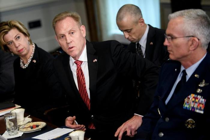 Acting US Secretary of Defense Patrick Shanahan (C) has been cleared of favoring his former employer Boeing in an internal Pentagon ethics investigation