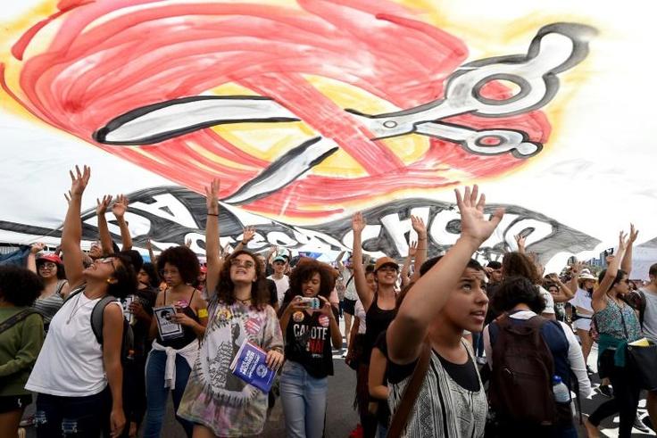 Brazilian students demonstrate during a strike organized by the National Students Union against budget cuts in capital city Brasilia