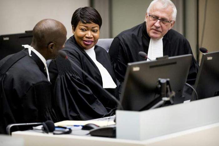 The US visa of ICC chief prosecutor Fatou Bensouda (C) was revoked over a possible probe involving American soldiers' actions since 2003 in the bloody Afghan conflict