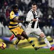 Parma's Ivorian forward Gervinho (L) holds off Juventus' Italian forward Federico Bernardeschi during the Italian Serie A football match Juventus vs Parma on February 2, 2019 at the Juventus stadium in Turin.