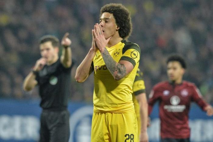 Borussia Dortmund's Belgian midfielder Axel Witsel sums up a frustrating night for the Bundesliga leaders who were held to a goalless draw at bottom side Nuremberg on Monday.
