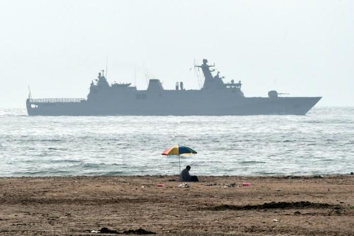 A Moroccan navy boat patrols the waters off Tangiers