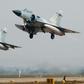 Two Indian Air Force Mirage 2000 fighters take off during the Indo-France joint air force excercise at Gwalior 12 February 2003, in Madhya Pradesh state