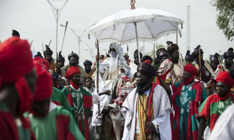 The Emir of Kano (C), Muhammadu Sanusi II is at the centre of tensions between new and old styles of governance