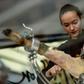 Spanish ham cutter Raquel Acosta shows her skills as more women enter the man's world of high-level cutters of Spain's famous dry-cured ham legs