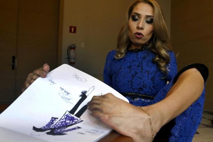 No arms, no problem: Mexican fashionista Adriana Macias has forged a path to success by designing apparel with her feet