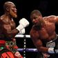 Daniel Dubois (right) sent Richard Lartey to the canvas with a powerful right hand