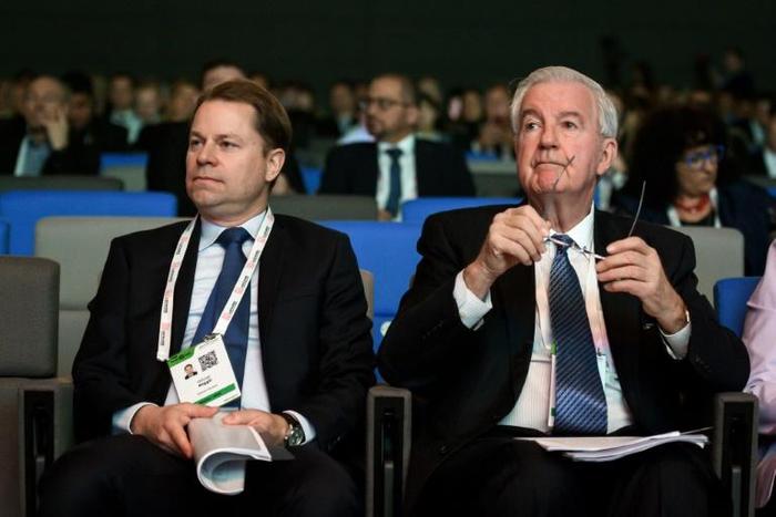 WADA director general Olivier Niggli (L) and World president Sir Craig Reedie attend the annual symposium of the World Anti-Doping Agency on March 13, 2019 in Lausanne. WADA is meeting to strike a gentleman’s agreement on who will take over from Reedie