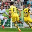Marco Reus inspired Borussia Dortmund to a crucial win over Freiburg in the Bundesliga on Sunday
