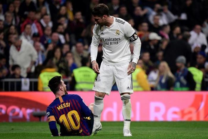 Sergio Ramos (right) argues with Lionel Messi (left) during Real Madrid's defeat to Barcelona last week.