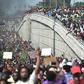 Demonstrators march through the streets of Port-au-Prince, on February 7, 2019