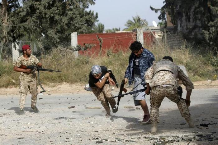 Two Libyan journalists detained more than three weeks ago while covering fighting on the outskirts of Tripoli have been released