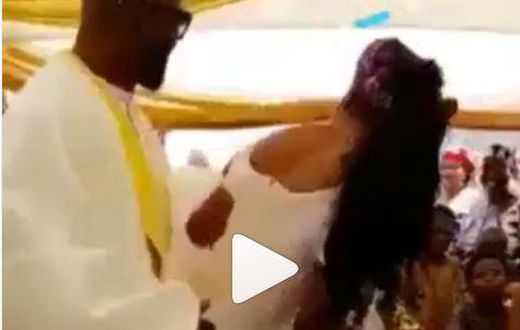 Angry bride pushes dirty dancing bridesmaid away to rescue her groom (Video)