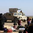 Civilians fleeing territory controlled by the Islamic State group in eastern Syria wait to be screened by US-backed forces on February 3, 2019