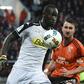 Bristol City were seconds away from having to settle for a draw, but Famara Diedhiou (L, pictured May 2017) held his nerve to convert a stoppage-time penalty