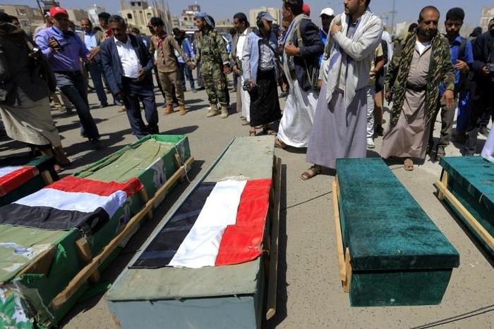 Yemenis gather for a funeral of schoolchildren killed in an explosion in the capital Sanaa