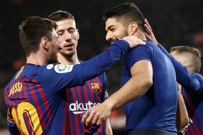 Luis Suarez (right) returns to England as Barcelona play Manchester United in the Champions League on Wednesday