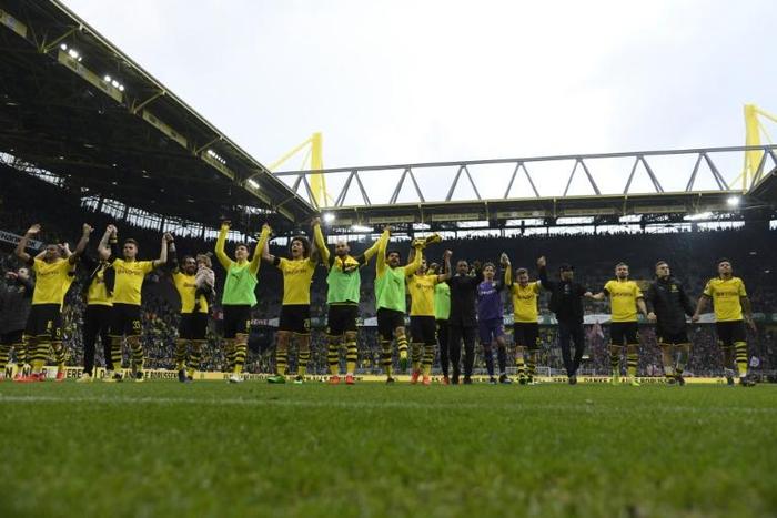 Borussia Dortmund kept themselves in the Bundesliga title race until the final week with a win over Fortuna Duesseldorf on Saturday