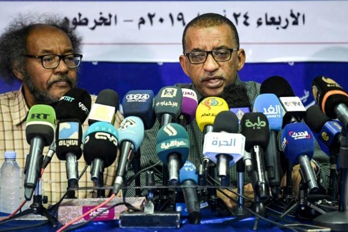 Sudanese civil society activists Muawia Shaddad (L) and Omar el-Digeir (R), two of the leaders of the protest movement the Alliance for Freedom and Change