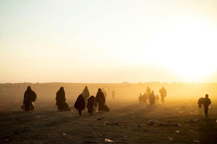 Thousands of men, women and children have streamed out of the Islamic State group's embattled holdout of Baghouz in eastern Syria in recent days