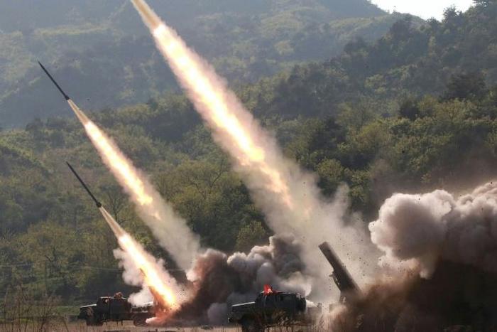 This May 9, 2019 picture released from North Korea's official Korean Central News Agency (KCNA) shows rocket launchers firing during a drill by units of the Korean People's Army