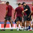 Jurgen Klopp with his players as they trained at the Metropolitano Stadium on Friday