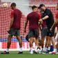 Jurgen Klopp with his players as they trained at the Metropolitano Stadium on Friday