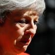 Britain's Prime Minister Theresa May said she would step down as Conservative Party leader on June 7