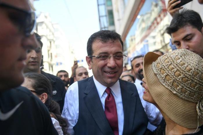 Social media users lashed out at CNN Turk after it stopped an interview with Ekrem Imamoglu (C) half an hour ahead of schedule
